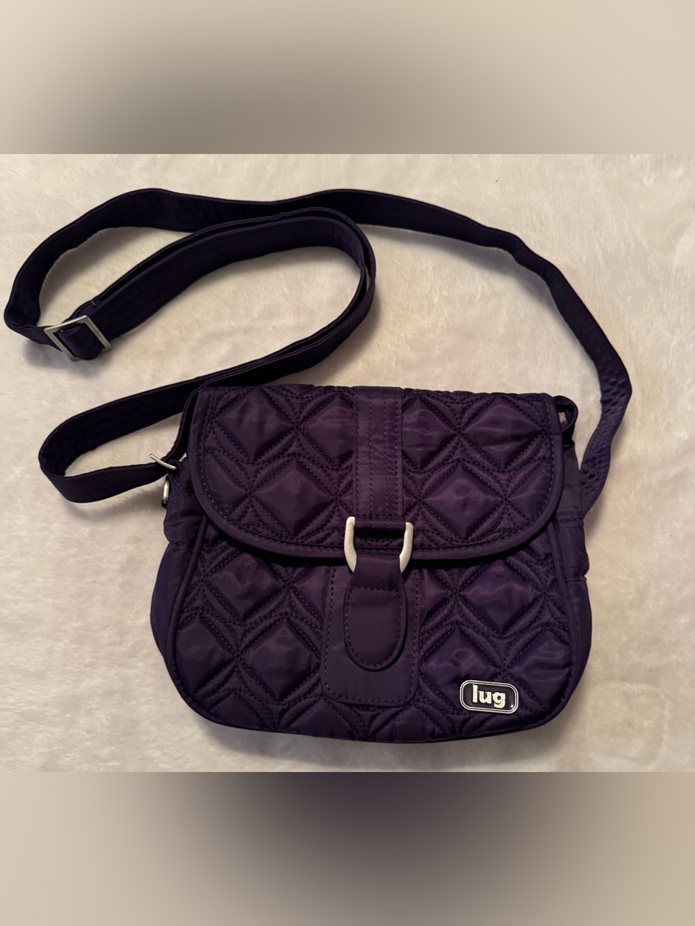 Lug Signature Swing Quilted Crossbody Bag in Deep Purple EUC